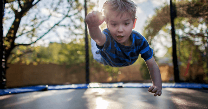 Young boy on a trampoline